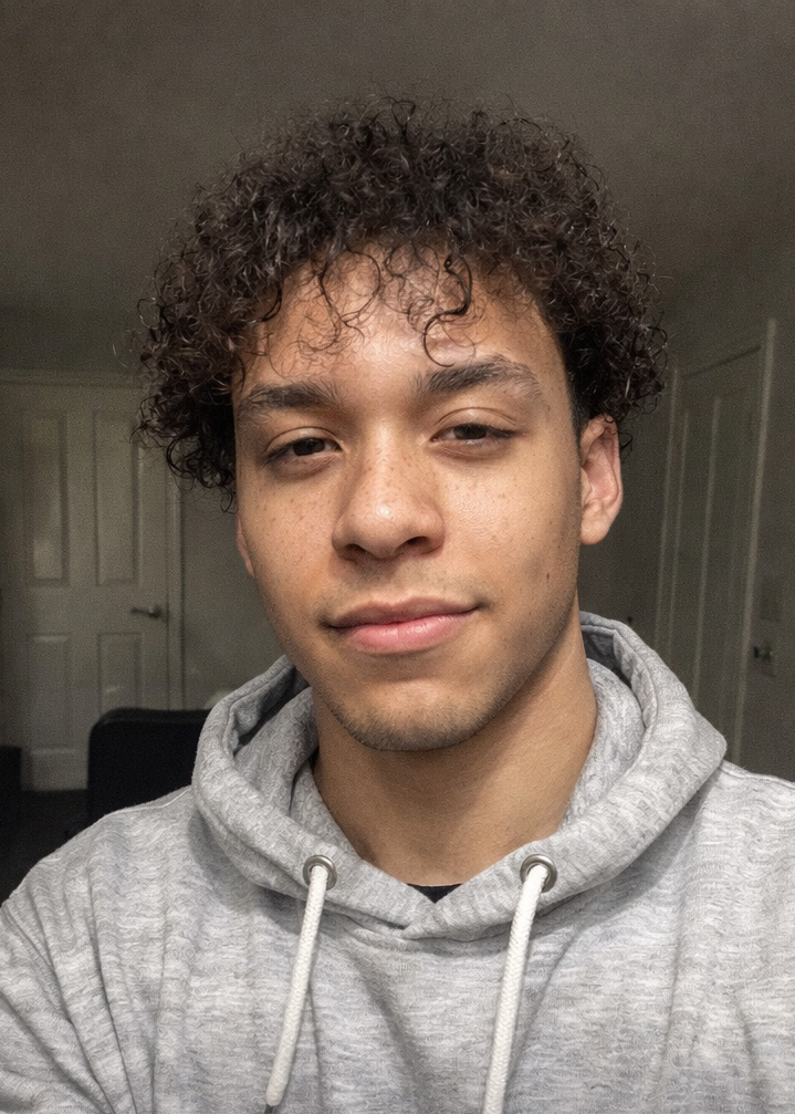 Person holding a 'Power Bull' shampoo bottle outdoors